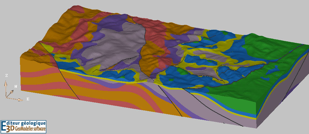 Modèle 3D du bassin houiller d’Alès réalisé avec GeoModeller lors du stage annuel de terrain de cartographie 3D. Sont représentés : le socle en orange et rose, les formations carbonifères en violet et gris, le Trias en jaune, le Lias en bleu et les formations post-liasiques en vert (Alès, Gard).